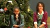 VIDEO: Sasha and Malia Obama take the spotlight during a visit to a children's hospital.