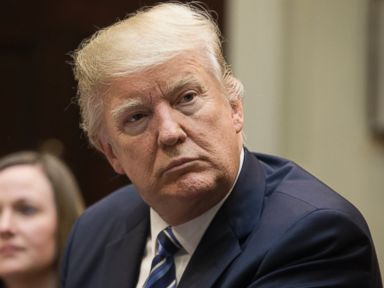 Trump pivots on wiretapping accusation, brushes aside tax leak