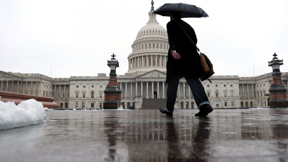 PHOTO: A person walks on Capitol Hill in Washington, Dec. 9, 2013.