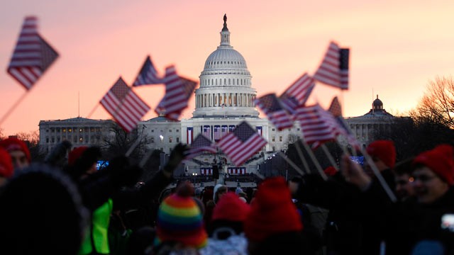 PHOTO: President Barack Obama supporters wave American flags on the National Mall in Washington, Jan. 21, 2013, prior to the start of President Barack Obama's ceremonial swearing-in ceremony during the 57th Presidential Inauguration.
