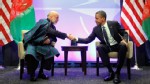 PHOTO: President Barack Obama, right, shakes hands with with Afghan President Hamid Karzai, left, during their meeting at the NATO Summit in Chicago, Sunday, May 20, 2012.