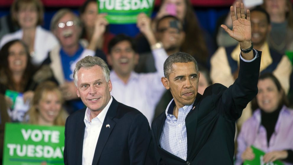 PHOTO: President Barack Obama appears at a campaign rally with supporters for Virginia Democratic gubernatorial candidate Terry McAuliffe, left, at Washington Lee High School in Arlington, Va., Sunday, Nov. 3, 2013.