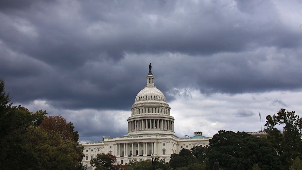 PHOTO: Dark clouds hang over U.S. Capitol in Washington