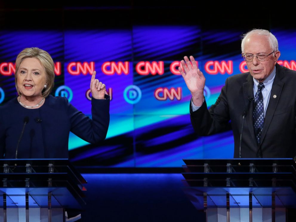 PHOTO: Democratic presidential candidate, Hillary Clinton argues a point as Sen. Bernie Sanders, reacts during a Democratic presidential primary debate at the University of Michigan-Flint, March 6, 2016, in Flint, Mich.