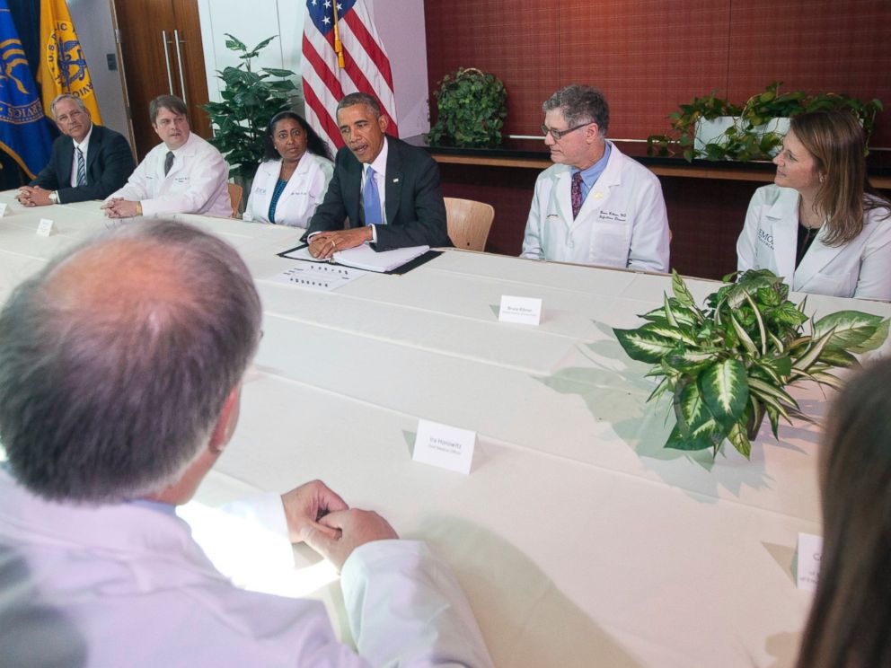 PHOTO: President Barack Obama, center, is pictured with Emory University doctors and healthcare professionals during a CDC meeting on Sept. 16, 2014 in Atlanta, Ga.