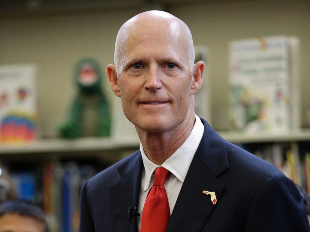 PHOTO: Florida Gov. Rick Scott waits to speak at the Dr. Carlos J. Finlay elementary school, June 1, 2015, in Miami.