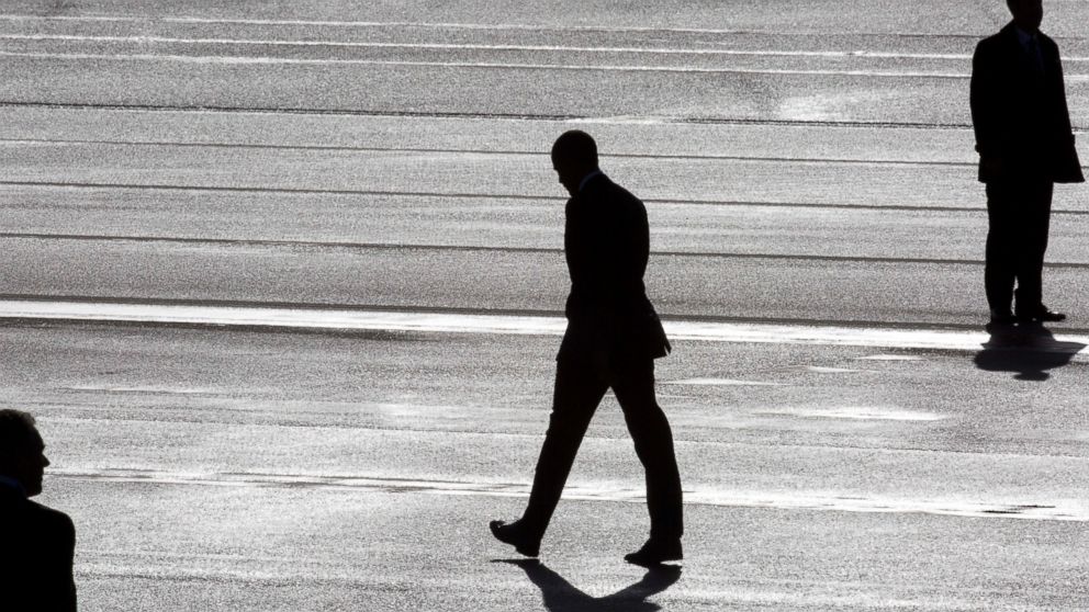 PHOTO: President Barack Obama, center, and two secret service agents