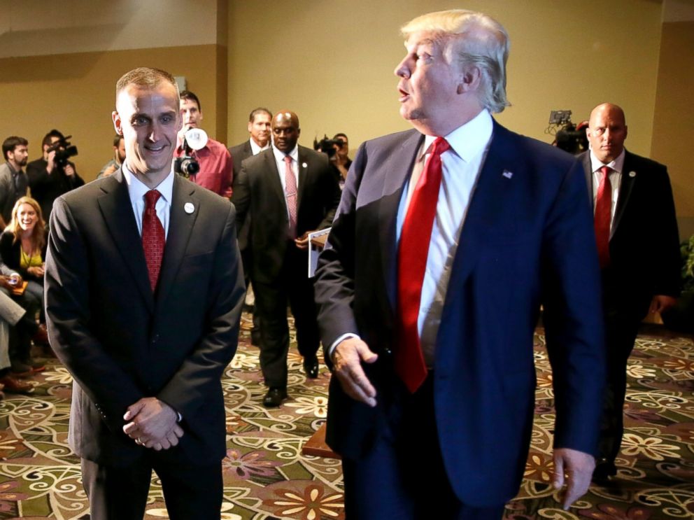 Donald Trump right walks with his campaign manager Corey Lewandowski after speaking at a news conference in Dubuque Iowa Aug. 25 2015