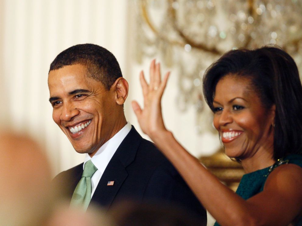 PHOTO: President Barack Obama and Michelle Obama arrive in the East Room of the White House in Washington as they host a St. Patricks Day reception, March 17, 2009.