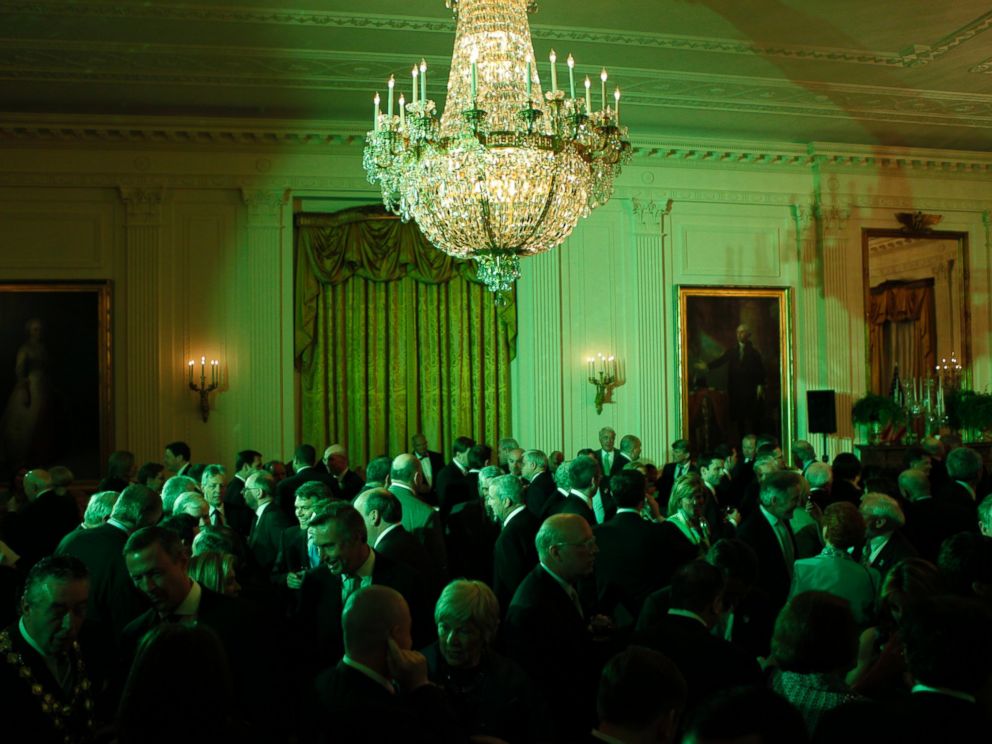 PHOTO: The East Room of the White House is bathed in green light at a St. Patricks Day reception hosted by President Barack Obama in Washington, March 17, 2009.