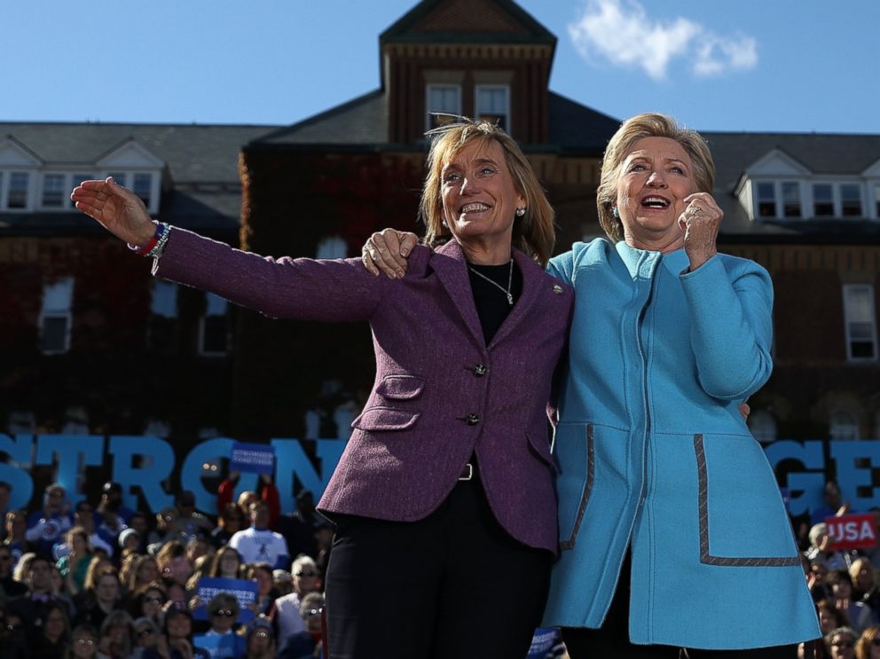 PHOTO: Democratic presidential nominee Hillary Clinton and New Hampshire Gov. Maggie Hassan look on during a campaign rally at Saint Anselm College on Oct. 24, 2016 in Manchester, New Hampshire.