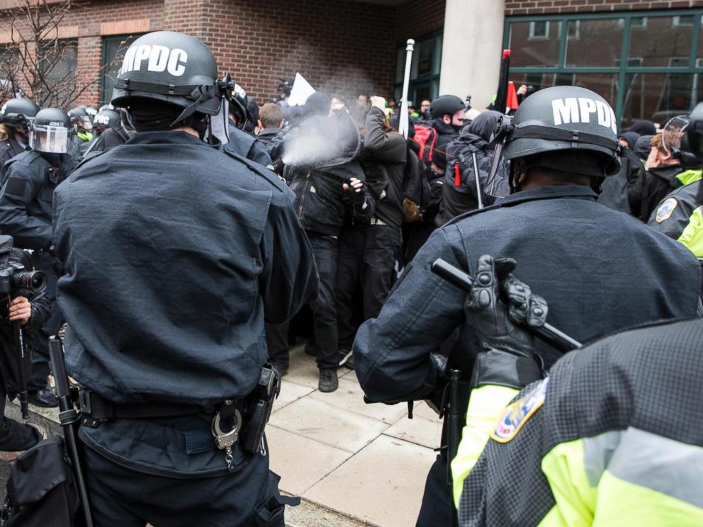 PHOTO: Police officers pepper spray a group of protestors before the inauguration of President-elect Donald Trump, Jan. 20, 2017, in Washington.