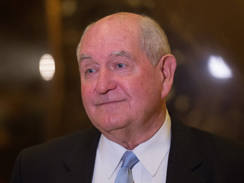 PHOTO: Former Georgia governor Sonny Perdue speaks to the media in the lobby of Trump Tower, Nov. 30, 2016, in New York.