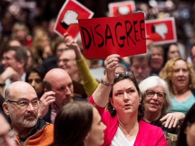 Trump suggests Obama was 'behind' town hall protests