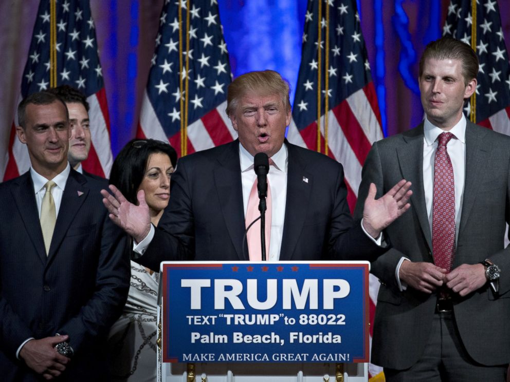 PHOTO: Donald Trump, center, speaks during a news conference with his son Eric Trump, right, and Corey Lewandowski, campaign manager for Trump, left, at the Mar-A-Lago Club in Palm Beach, Florida, March 15, 2016.