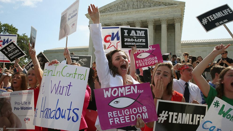 PHOTO: Hobby Lobby supporters react to the U.S. Supreme Court decision June 30, 2014 in Washington, DC.