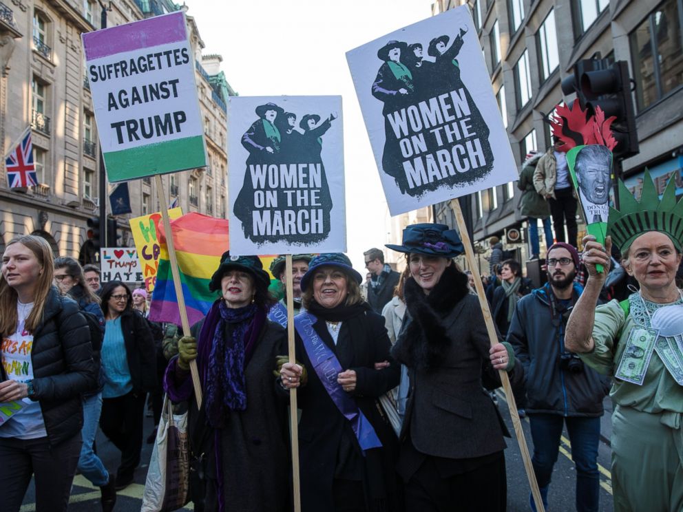 PHOTO: Protesters in costume holding placards march from The US Embassy in Grosvenor Square towards Trafalgar Square during the Womens March, Jan. 21, 2017, in London, England.