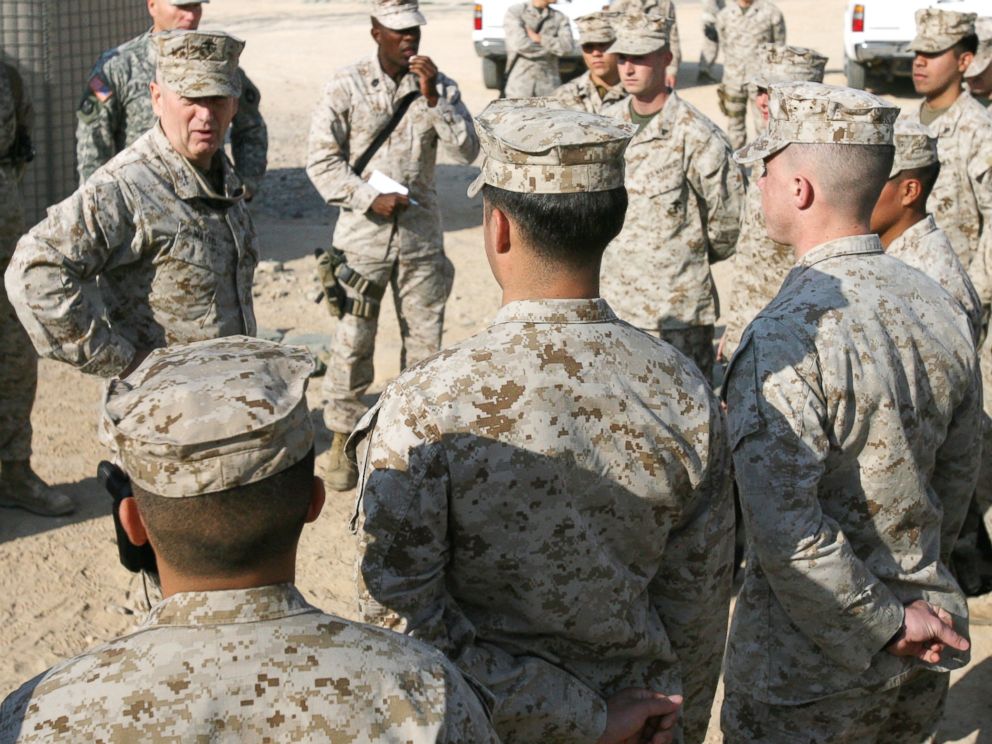 PHOTO: Lt. Gen. James M. Mattis, Commanding General, U.S. Marine Forces Central Command and 1st Marine Expeditionary Force, speaks with Marines during a visit to Camp Taqaddum, Iraq, Dec. 9, 2006.