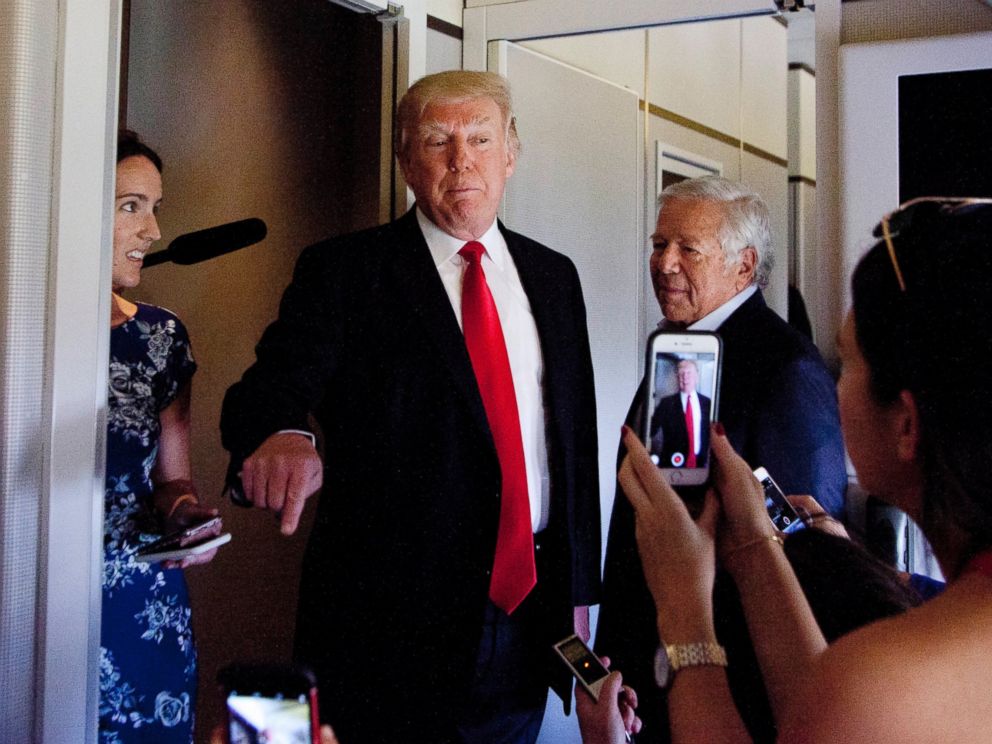 PHOTO: President Donald Trump talks to press corps inside Air Force One at the Palm Beach International Airport, March 19, 2017, in West Palm Beach, Fla.