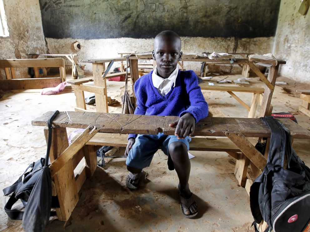 PHOTO: Seven-year-old Barack Obama Okoth, named after President Barack Obama, sits inside an empty classroom as he speaks with Reuters at the Senator Obama primary school in Nyangoma village in Kogelo, west of Kenyas capital Nairobi, June 23, 2015.