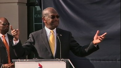 PHOTO: Herman Cain Says He's Suspending Campaign