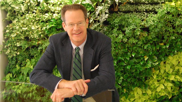 PHOTO: Bob Deans likes to spend time outside. When he's indoors, the plant wall in the kitchen of the NRDC's building is a comforting reminder of nature.