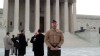 PHOTO: Major David McCombs , U.S. Marine Corps, standing in line to hear arguments before the U.S. Supreme Court on whether the government can make it a crime to lie about war medals.