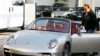 VIDEO: Arnold Schwarzenegger parks his Porschge in a red zone.