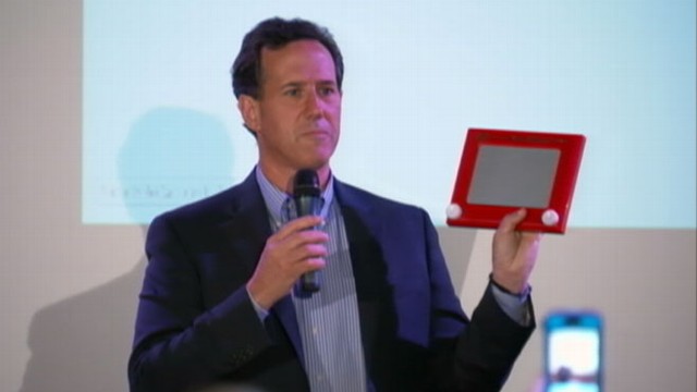VIDEO: Rick Santorum, Newt Gingrich attack Mitt Romney by using an Etch-A-Sketch.