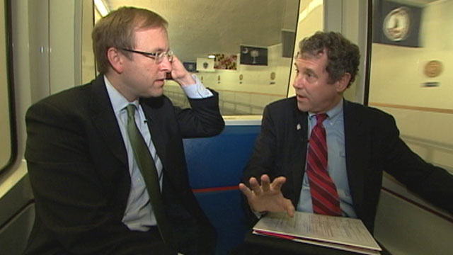 PHOTO Jonathan Karl rides the subway with Senator Sherrod Brown.