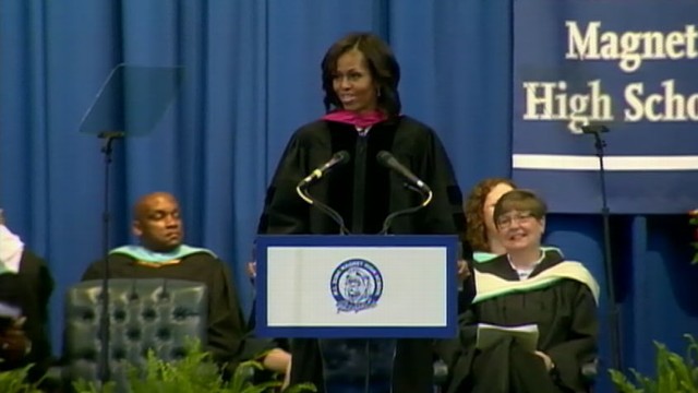 VIDEO: The first lady encourages high school graduates to challenge themselves in order to find happiness.