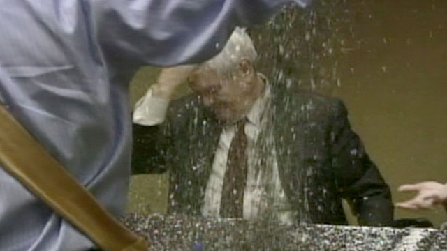 PHOTO: Newt Gingrich and his wife were participating in a book signing at the Minnesota Family Council?s annual dinner in Minneapolis when a protestor dumped a box containing glitter over them.