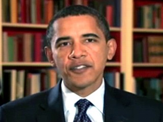 PHOTO Obama speaks during his Saturday morning video address, on January 24, 2008.
