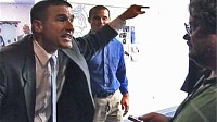 Photo: Arizona pastor who prays for Obama's death gets into an argument with reporters.