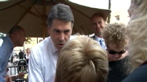 NH Mother Uses Child as a Prop to Question Rick Perry on Evolution