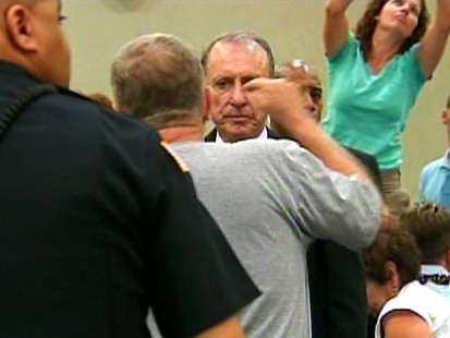 VIDEO: Angry man yells at Senator Specter during town hall meeting on health care.