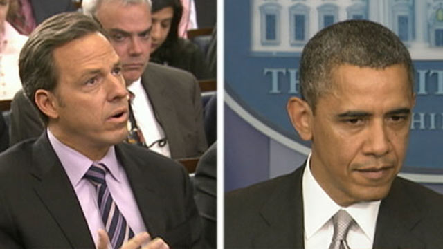 PHOTO: President Obama reacts to a question from ABCs Jake Tapper during a press briefing at the White House, Dec. 19. 2012.