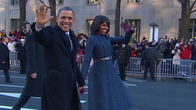 VIDEO: The first couple leaves presidential limousine to applause from crowds in Washington.