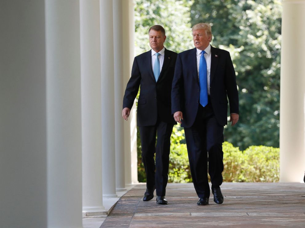 PHOTO: President Donald Trump and Romanian President Klaus Werner Iohannis walk to the Rose Garden for their joint news conference at the White House, June 9, 2017.