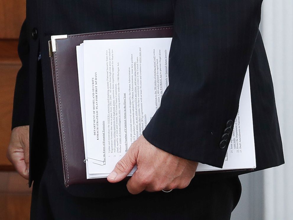 PHOTO: In this Nov. 20, 2016, photo, Kansas Secretary of State Kris Kobach holds a stack of papers as he prepares to meet with President-elect Donald Trump at the Trump National Golf Club Bedminster clubhouse, Nov. 20, 2016, in Bedminster, New Jersey.