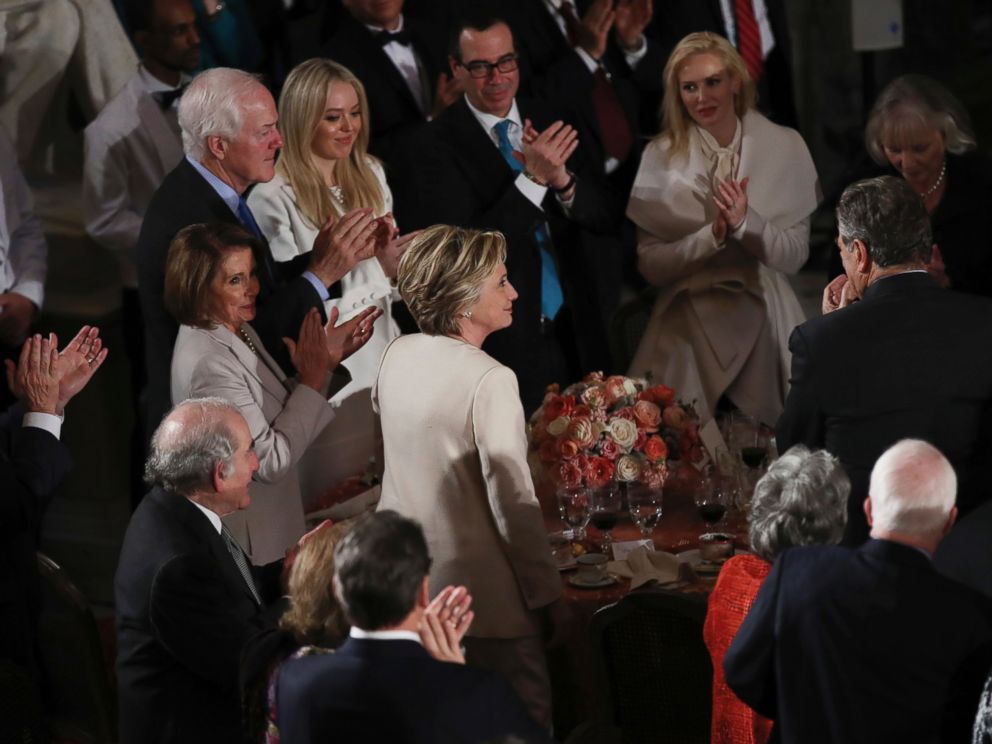 PHOTO: Hillary Clinton stands as she is recognized by President Donald Trump during his speech at the inaugural luncheon at the Statuary Hall in the Capitol, Jan. 20, 2017, in Washington.