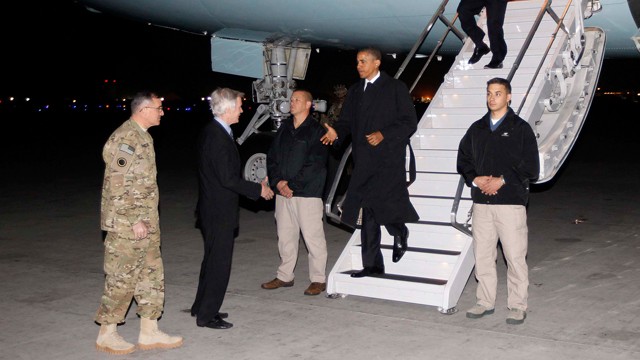 PHOTO: President Barack Obama is greeted by Lt. Gen. Curtis "Mike" Scaparrotti, left, and U.S. Ambassador to Afghanistan Ryan Crocker, second left, as he steps off Air Force One at Bagram Air Field in Afghanistan, May 1, 2012.