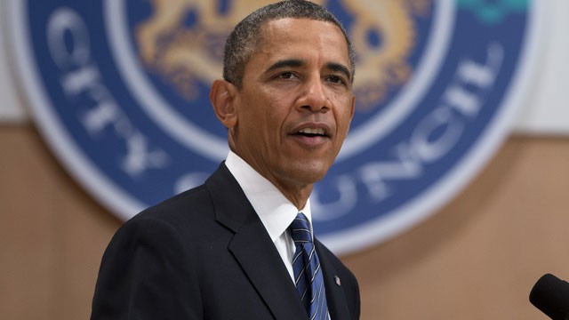PHOTO: President Barack Obama gestures during a speech at the Belfast Waterfront Hall on Monday June 17, 2013, in Belfast, Northern Ireland.