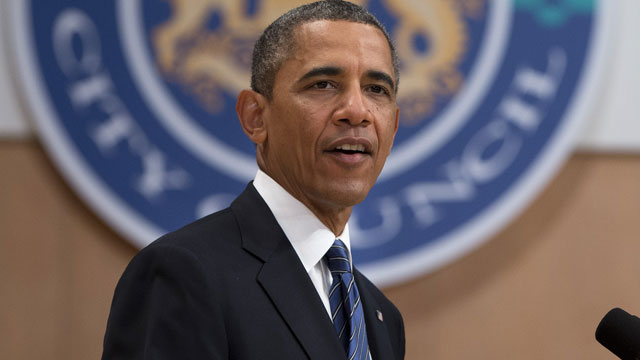 PHOTO: President Barack Obama gestures during a speech at the Belfast Waterfront Hall on Monday June 17, 2013, in Belfast, Northern Ireland.