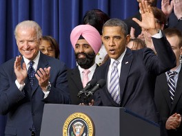 PHOTO: President Barack Obama, VP Joe Biden, with Navroop Mitter in the background, talk about the payroll-tax cut and jobless-benefits extension compromise that bi-partisan House and Senate conferees reached last week, the White House, Washington DC, Feb