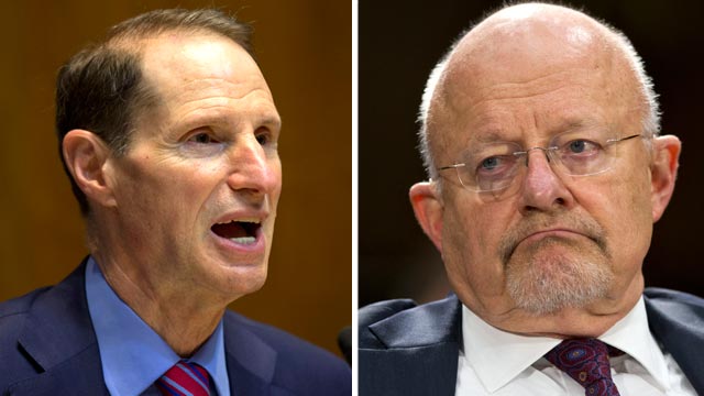 PHOTO: Senate Energy and Natural Resources Chairman Sen. Ron Wyden, left, D-Oregon, speaks on Capitol Hill in Washington, June 6, 2013. National Intelligence Director James Clapper prepares to testify on Capitol Hill in Washington, April 18, 2013.