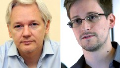 PHOTO: Julian Assange speaks to the media inside the Ecuadorian Embassy in London ahead of the first anniversary of his arrival there on June 19, 2012. This June 9, 2013 photo provided by The Guardian newspaper in London shows Edward Snowden, who worked a