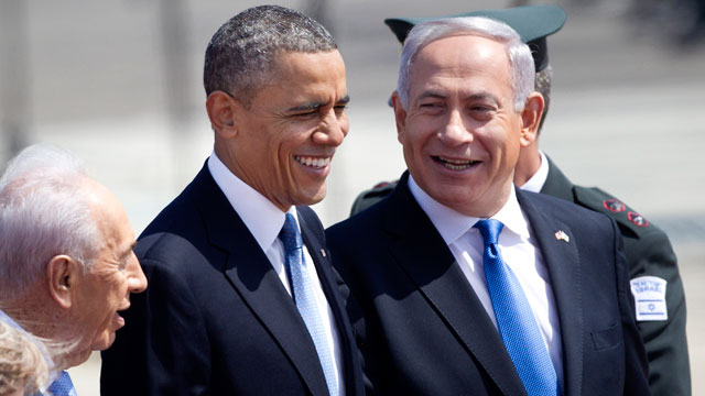 PHOTO: US President Barack Obama, and Israel's prime minister Benjamin Netanyahu, right, laugh as they walk during a welcoming ceremony upon Obama's arrival at Ben Gurion airport near Tel Aviv, Israel, March 20, 2013.