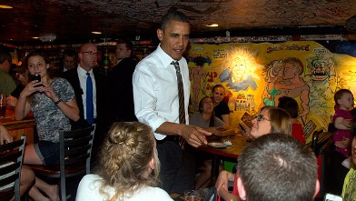 PHOTO: President Barack Obama greets people at The Sink Restaurant and Bar, Tuesday, April 24, 2012, in Boulder, Colo.
