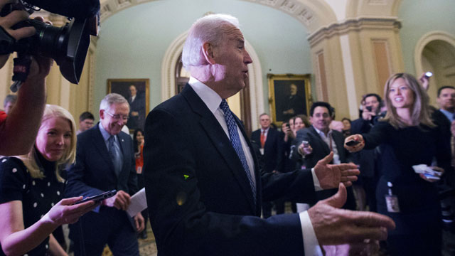 PHOTO: Vice President Joe Biden, center, with Majority Leader Harry Reid, left, of Nevada, arrive for a Senate Democratic caucus meeting about the fiscal cliff, on Capitol Hill Monday, Dec. 31, 2012.